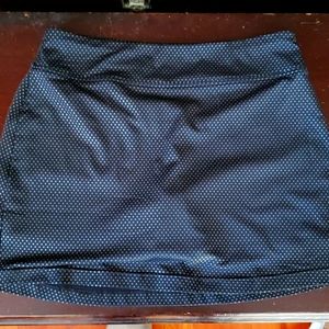 Black with shiney polka-dot golf skort